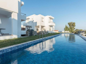 Attractive Holiday Home in Gennadi with Shared Swimming Pool